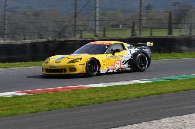 Scarperia, 5 April 2024: Chevrolet Corvette C6 ZR1 year 2010 in action during Mugello Classic 2024 at Mugello Circuit in Italy. clipart