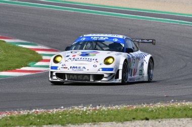 Scarperia, 5 April 2024: Porsche 997 GT3 RSR year 2009 in action during Mugello Classic 2024 at Mugello Circuit in Italy. clipart