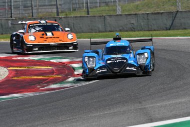 Scarperia, İtalya - 29 Eylül 2024: LENTOUDIS-BRADLEY-QUINN 'in ALGARVE PRO RACING takımından Oreca 07 Gibson Mugello' nun 4h..