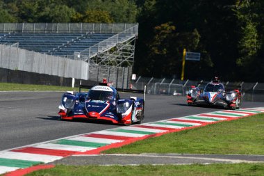 Scarperia, İtalya - 29 Eylül 2024: Birleştirilmiş AUTOSPORTS takımından Oreca 07 Gibson SCHNEIDER-MEYRICK-JARVIS 'in sürüşü Mugello' nun saat 4 'ünde devam ediyor.