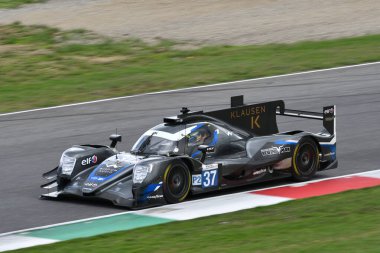 Scarperia, İtalya - 29 Eylül 2024: FLUXA-JAKOBSEN-MIYATA Mugello 'nun 4h' si sırasında hareket halindeki FLUXA-JAKOBSEN-MIYATA takımından Oreca 07 Gibson.