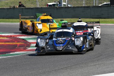 Scarperia, İtalya - 29 Eylül 2024: FLUXA-JAKOBSEN-MIYATA Mugello 'nun 4h' si sırasında hareket halindeki FLUXA-JAKOBSEN-MIYATA takımından Oreca 07 Gibson.
