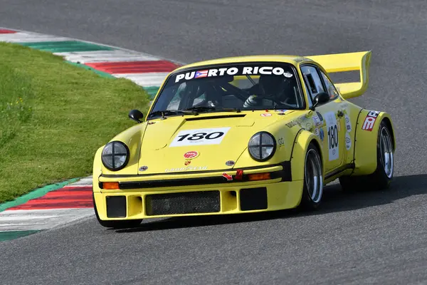 Scarperia, İtalya - 5 Nisan 2024: Porsche 934-5 yıl 1977 Mugello Classic 2024 'te Mugello Circuit.