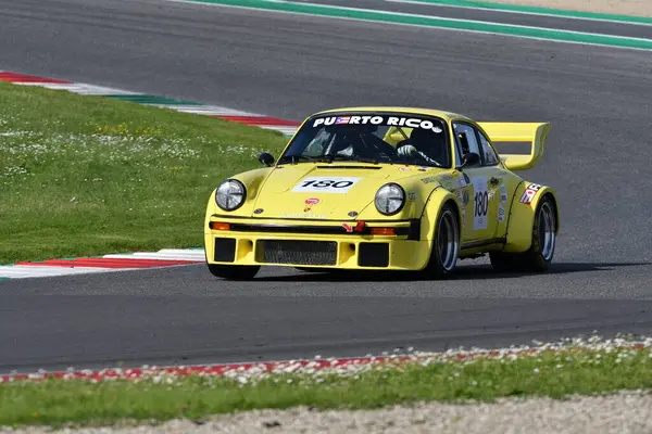 Scarperia, İtalya - 5 Nisan 2024: Porsche 934-5 yıl 1977 Mugello Classic 2024 'te Mugello Circuit.