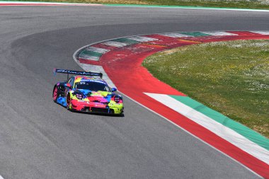 Scarperia, İtalya - 20 Mart 2025: Porsche 911 GT3 R (992) of Team MANAMAURI ENERJY by EBIMOTORS drive by Broggi-Castro-Nicolae during 12 h Michelin at Mugello Circuit