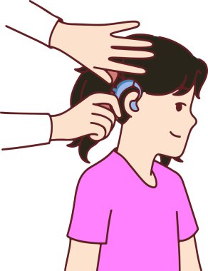 Pembe gömlekli bir kız işitme cihazı takıyor. Bir doktor ona yardım ediyor.