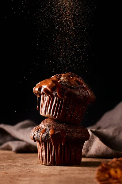 Two Gooey Chocolate Muffins Stacked Each Other Dripping Chocolate Sprinkled — Stock Photo, Image