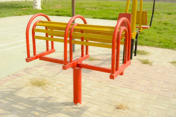 play ground colorful big plastic toy set for children school or garden park on day noon light in city park. Children\'s playground in the public park. equipment for exercise in a park.