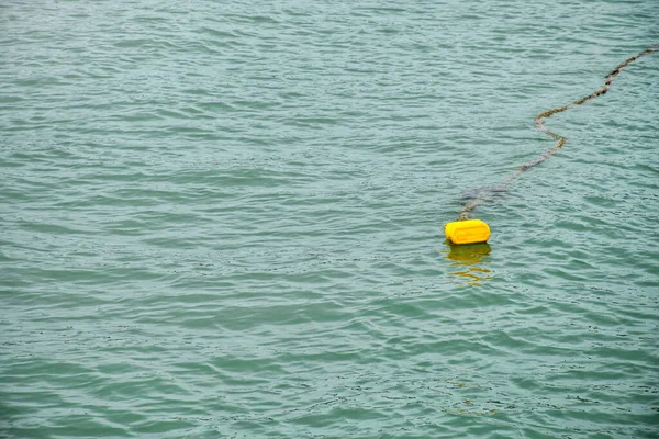 Yellow Buoy Water Broken Indicates Danger Zone Sea Background Sea — Stock Photo, Image