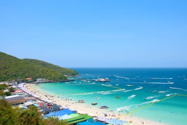 Aerial view of the beautiful beach and pier of Koh Larn is a popular tropical beach destination with white sand and crystal clear water in Thailand. Beautiful beaches and sea water on the island. clipart