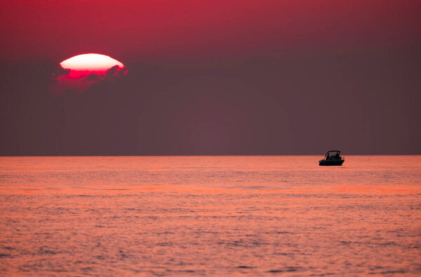 Silhouette boat in sea against sky during sunset, Croatia