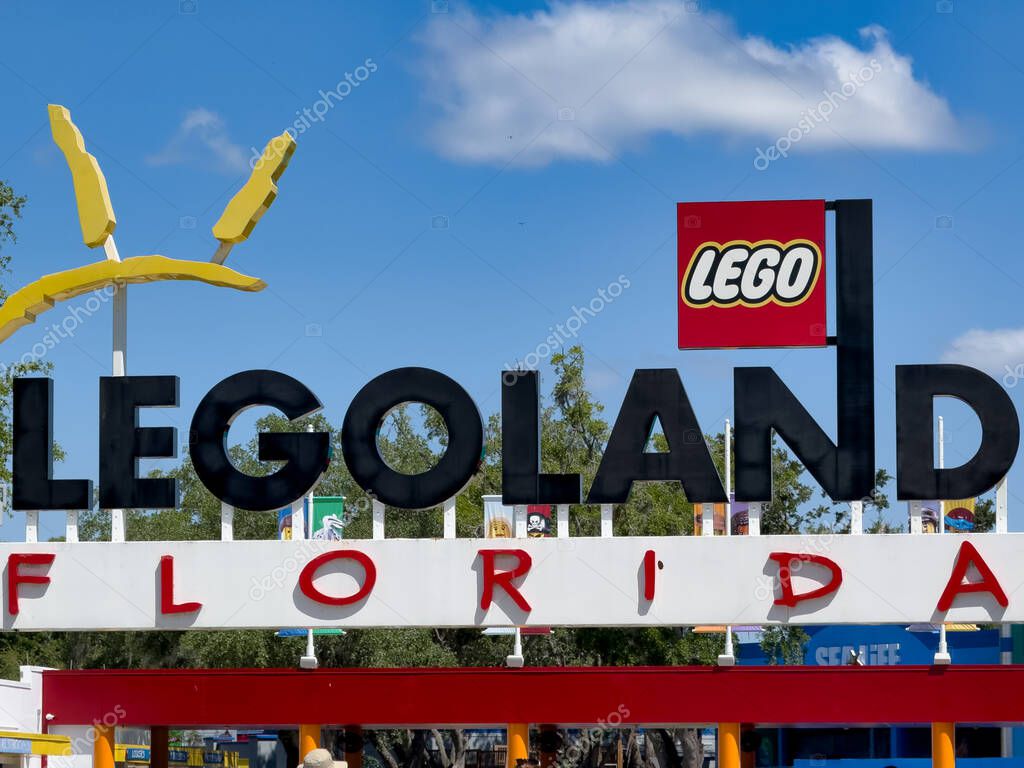 Main entrance of LEGOLAND Florida with the LEGO sign and logo against a clear blue sky. April 18, 2025, in Orlando, Florida