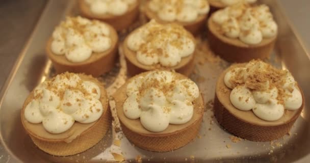 Process Making Mini Tarts Sprinkle Decorate Mini Tarts Grated Nuts — Stock Video