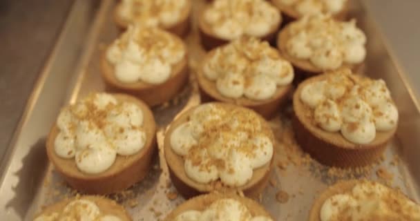 Process Making Mini Tarts Sprinkle Decorate Mini Tarts Grated Nuts — Stock Video