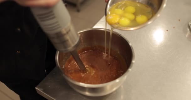 Adding Eggs Bowl While Immersion Blender Running Preparation Pastry Dough — Stock Video