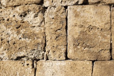 Taş duvarın bir parçası. Kahverengi tuğla duvar arkaplan dokusu
