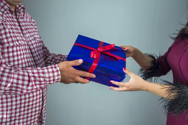 man giving present to his girlfriend