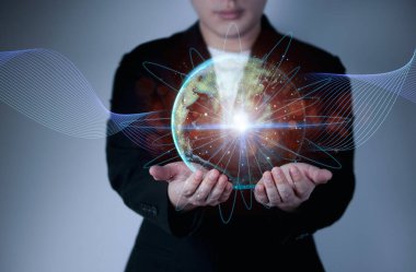 İş adamı eliyle küresel bir ağ bağlantısı tutuyor. 3d oluşturma