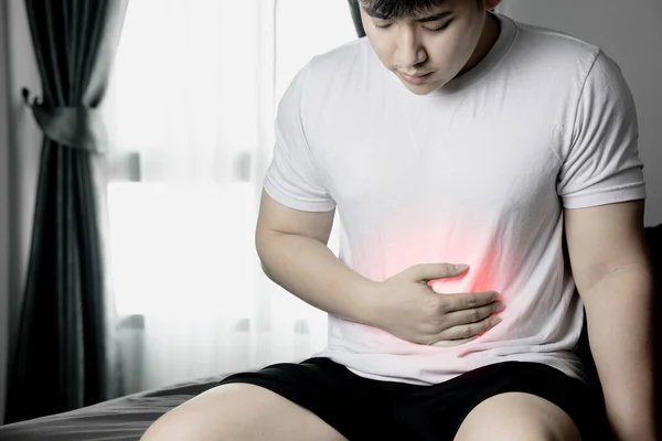 Enfermo Asiático Hombre Con Estómago Dolor Casa —  Fotos de Stock