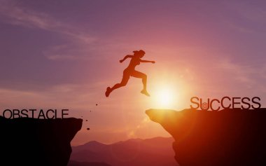 Effort and commitment to success. Silhouette of woman jumping over a cliff to reach success with evening sunlight. concept of setting goals for success and effectively solving problems and obstacles clipart