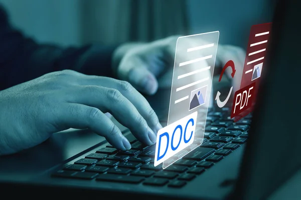 Convert PDF files with online programs. Users convert document files on platform using an internet connection at desks. concept of technology transforms documents into portable document formats.