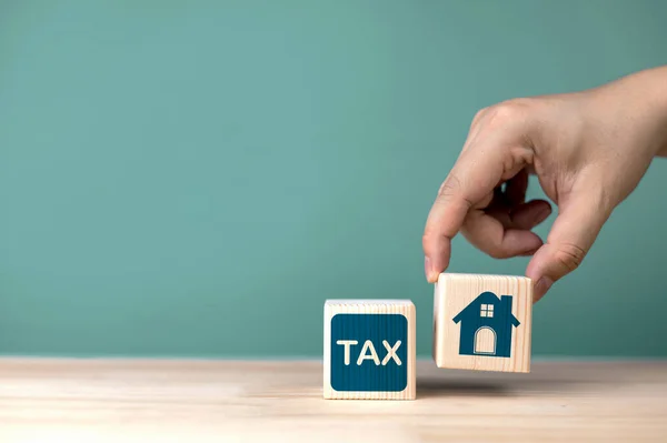 Real estate tax concepts and home purchase fees. with copy space