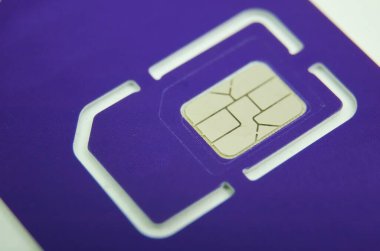 Beyaz arkaplanda GSM SIM Kartın Macro Fotoğrafı