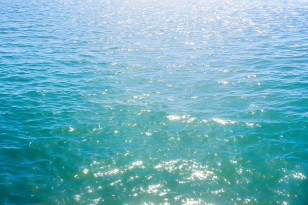 Blue sea water texture background. Blue sea water background. Top view.