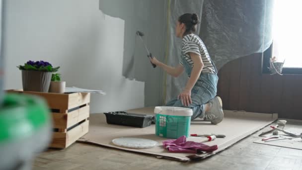 Slow Motion Shot Young Woman Painting Wall Roller — Stockvideo