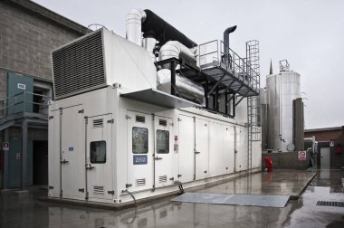 Industrial factory. His gas production machinery shot outdoors