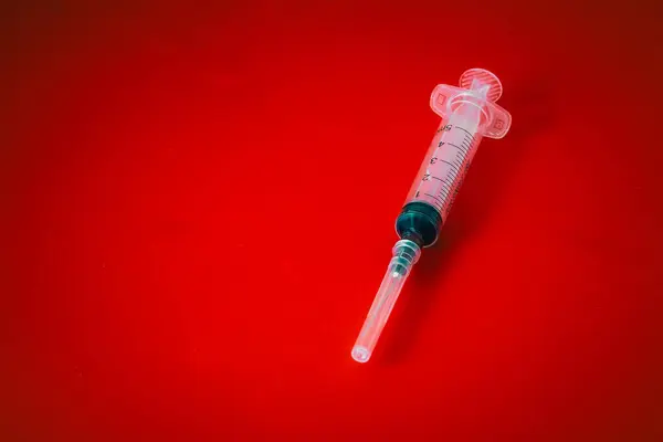 Red Medical Syringe Needle Red Blood Black Background Copy Space — Stock Photo, Image