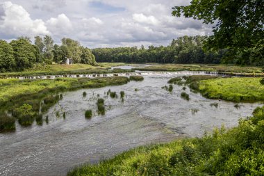 Venta Rapid waterfall. Ventas Rumba, the widest waterfall in Europe, Kuldiga, Latvia. clipart