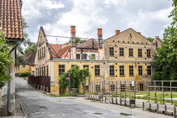 stock image Kuldiga, Latvia - July 3, 2023: Old house with removed roof ready for repair for and new roof.