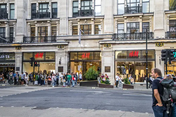 stock image London, UK - September 14, 2023: HM store on busy Regent Street full of shoppers.