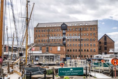 Gloucester, UK- August 19, 2023: Gloucester Docks at Sharpness Canal. The docks include fifteen Victorian warehouses. Alexandra warehouse. clipart