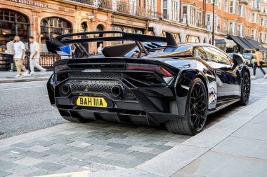 London, UK- August 19, 2023: Black colored Lamborghini Huracan STO supercar in Mayfair. clipart