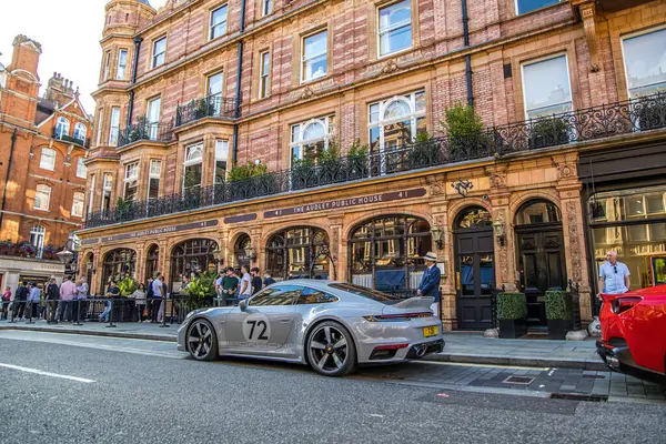 stock image London, UK- August 19, 2023: Supercars Porsche and Ferrari park on Mount street Mayfair area.