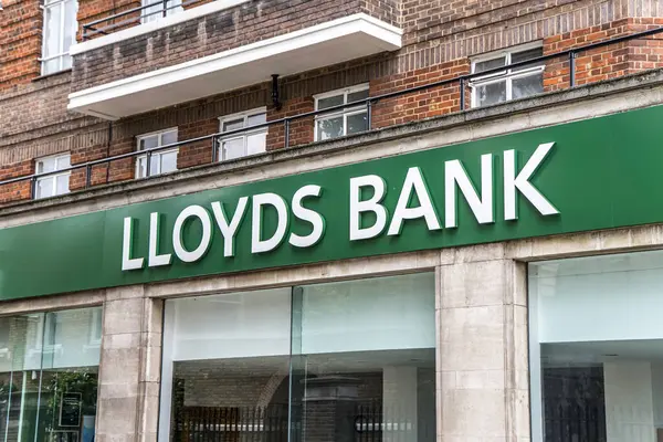 stock image London, UK- August 6, 2023: Lloyds Bank sign logo on the corner in Chelsea.