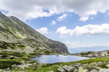 Mountain landscape in the Western Carpathians. Pond Lake Pleso nad Skokom in Mlynicka Valley, Vysoke Tatry High Tatras, Slovakia.