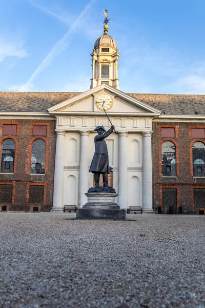 stock image London, UK - September 14, 2023: The facade of the Royal Hospital showing a statue of a Chelsea Pensioner, Kensington and Chelsea.
