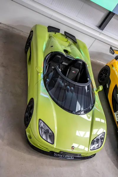 stock image Bradford-on-Avon, UK- August 28, 2023: Green Koenigsegg Super Vettura parked in storage unit.