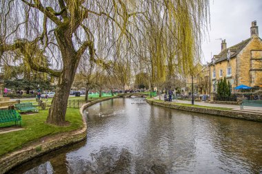 Bourton On Water, UK - May 10, 2023: Town center and river Windrush, Cotswold's. clipart