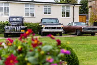 Bristol, UK- 11 Ağustos 2024: American Truck and Muscle car V8 Engine Nostalgia Retro Vintage Car Meet Show.