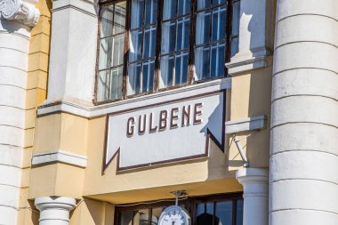 Gulbene, Latvia- July 12, 2023: Gulbene train station entrance sign. clipart