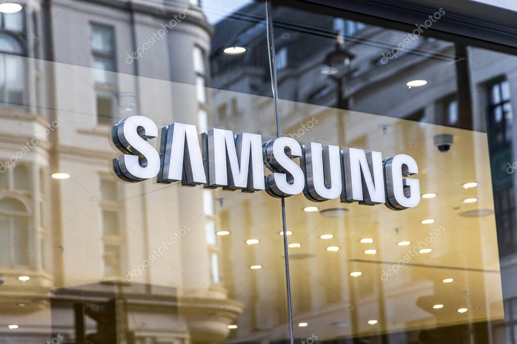 London, UK- September 19, 2024: Samsung tech brand lettering logo on glass window. It is South Korea company manufacturing electronics.