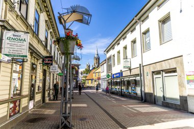 Liepaja, Latvia - June 13, 2024: Old Tirgonu street iela popular old pedestrian street full of boutique shops and restaurants in Liepaja town center. clipart