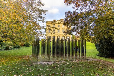 Bristol , UK - November 11, 2023: Follow Me Jeppe Hein Mirror Maze, oriental mirror labyrinth in Bristol University Royal Fort Gardens clipart