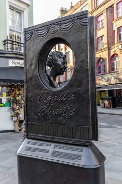 London, UK- September 19, 2024: Bronze Agatha Christie statue in London, celebrating the iconic author's legacy. A tribute to the Queen of Crime in the West End. clipart