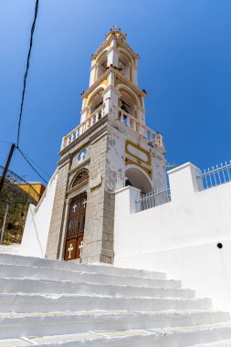 Symi, Yunanistan - 10 Mayıs 2024: Panagia Kecharitomeni Kulesi.