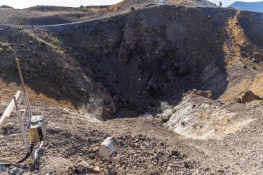 Geothermal Features on the Volcanic Slopes of Tholos Naftilos with Steaming Crater.